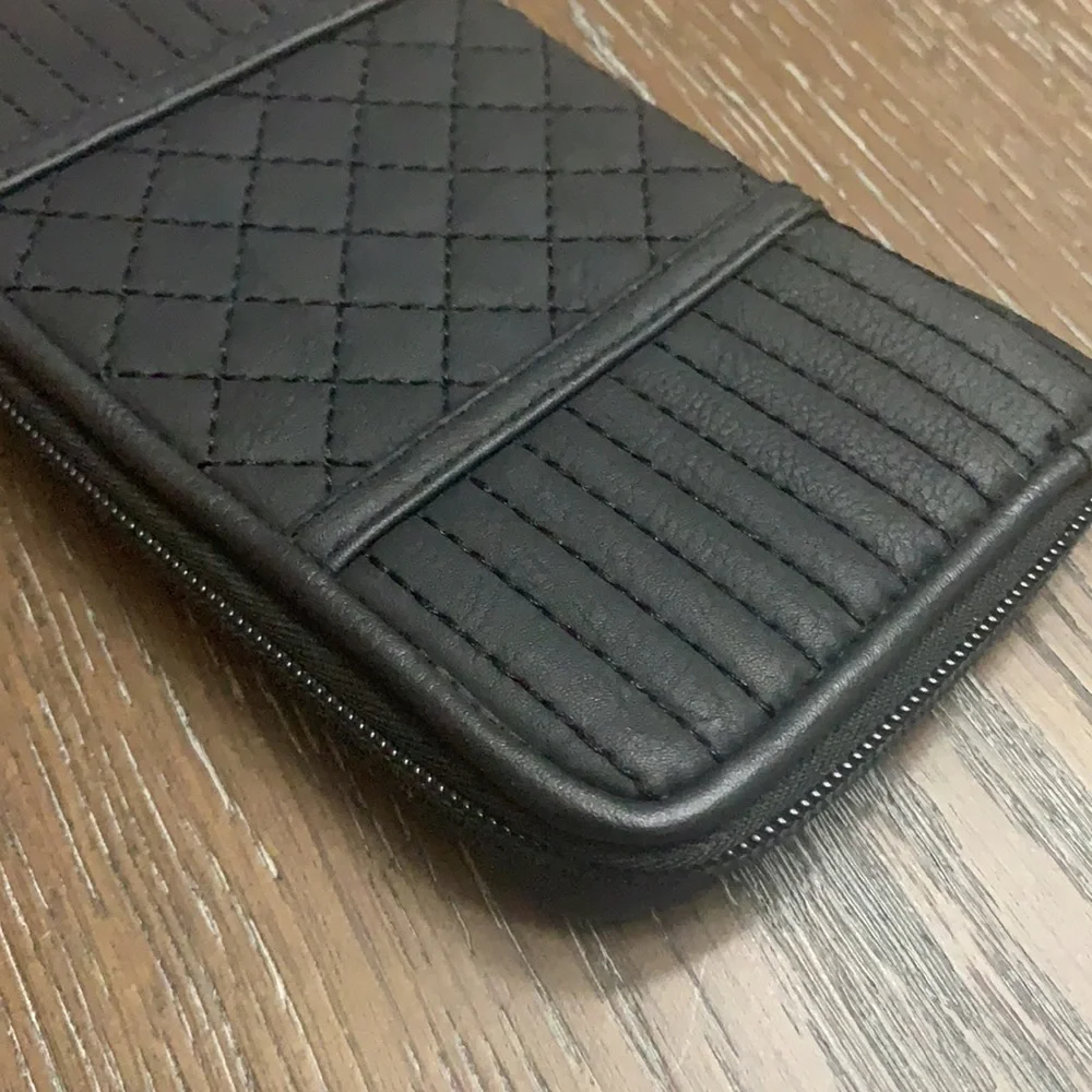 Unbranded black with black brads wristlets